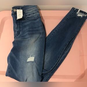 Bebe heartbreaker skinny high rise cut hem jeans 27